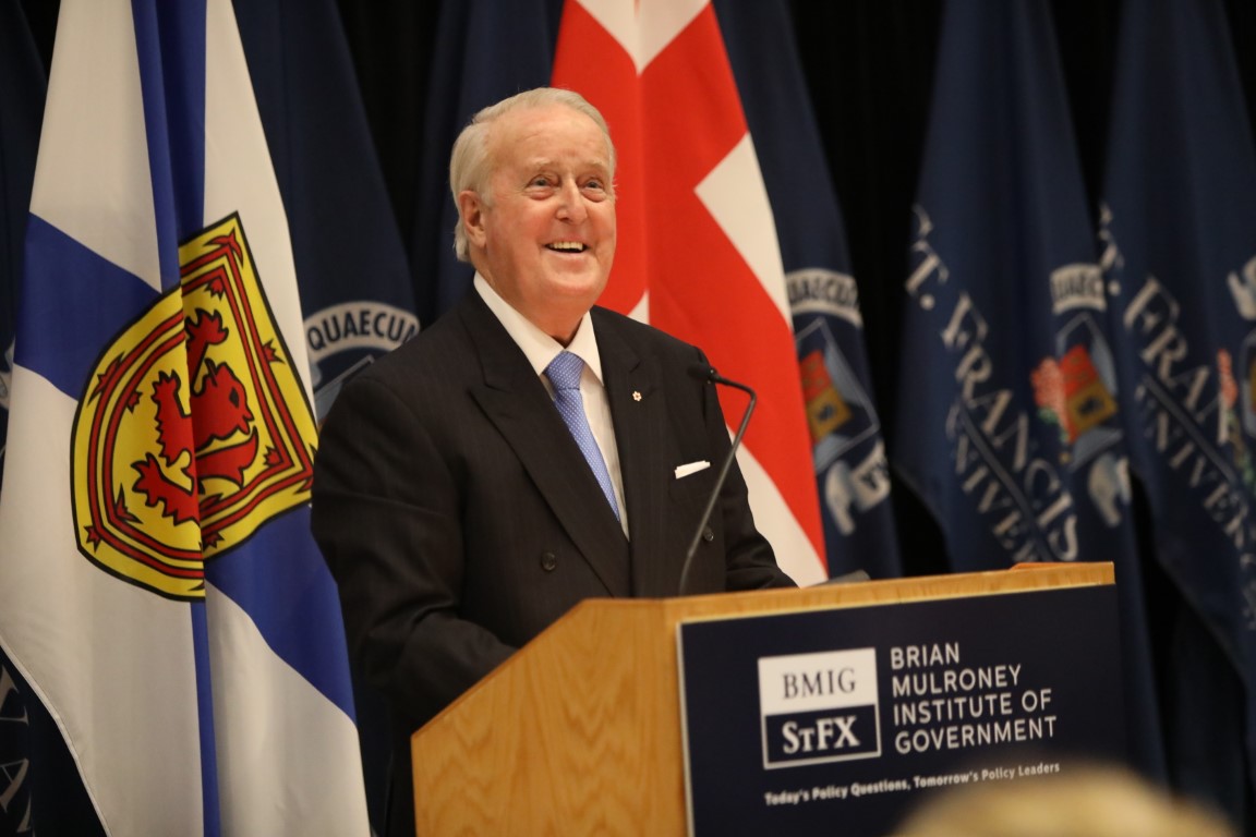 Brian Mulroney Speaking at a podium